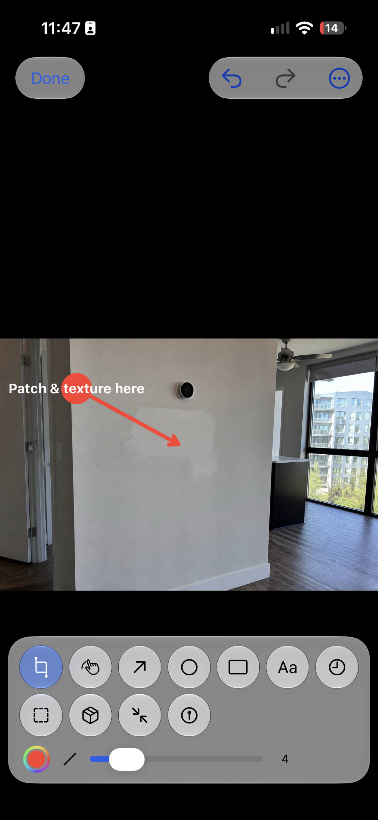 CloseoutLog photo annotation with arrow and callout on a drywall patch